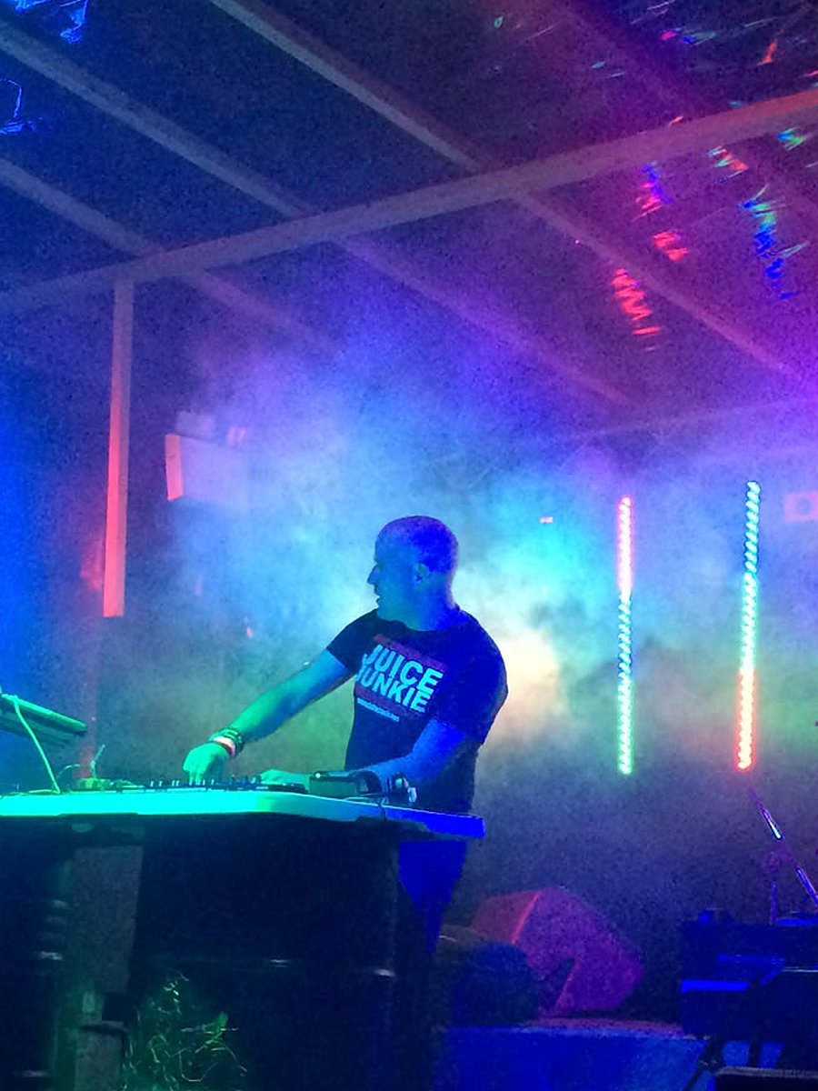 Neil Martin DJing on stage